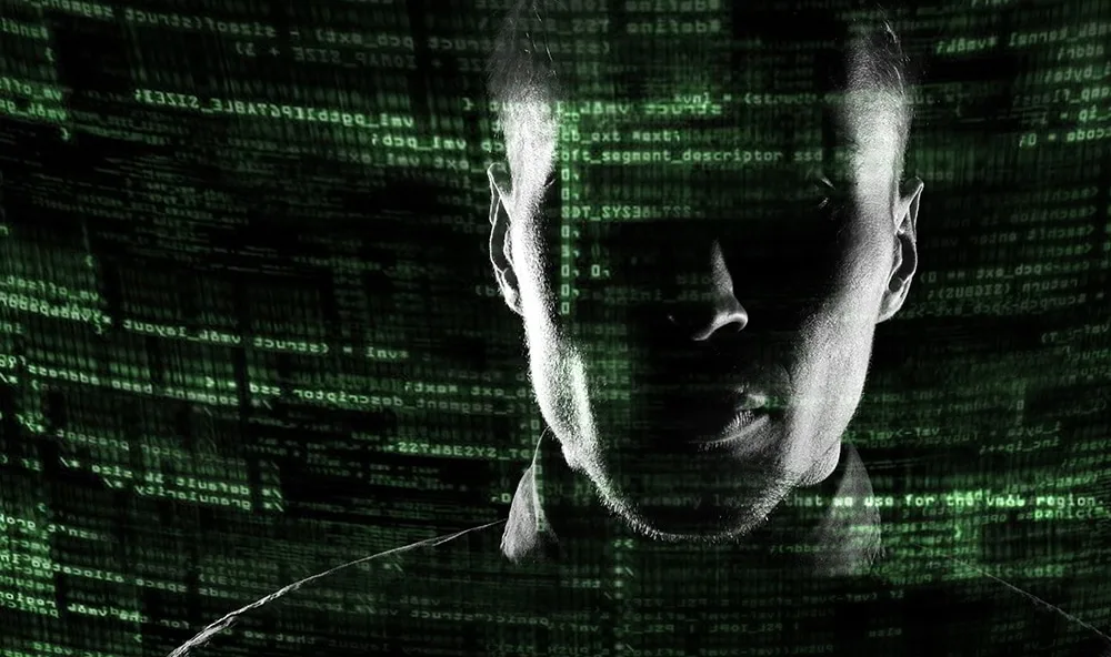 Silhouette of a hacker uses a command on graphic user interface